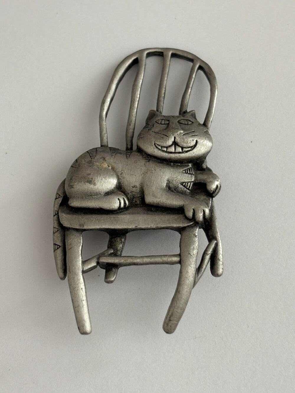 JJ Jonette Jewelry  Cheshire Cat on a Chailr Brooch Pewter